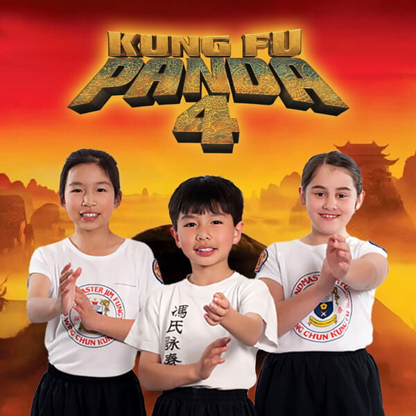 Children strike a Kung Fu pose in a scene from Kung Fu Panda 4