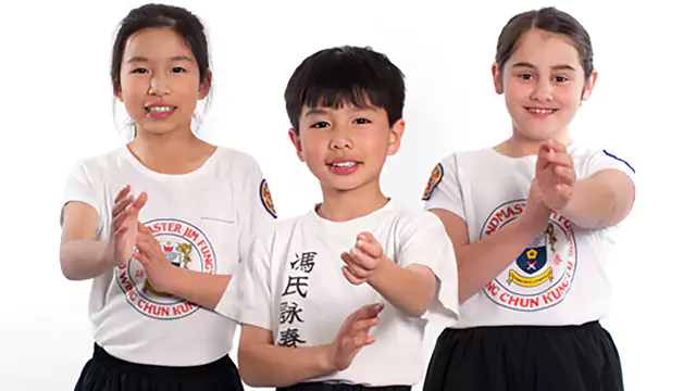 Children from our Kids' Kung Fu classes demonstrate the Wing Chun stance and guard.