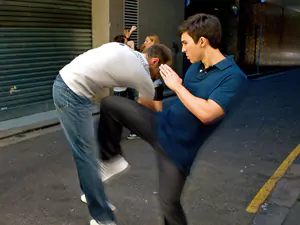 Tristan Fung demonstrates a latch and knee strike in a street self-defence scenario.