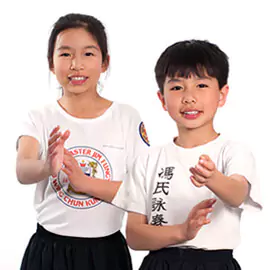 Children practise the Wing Chun guard