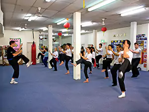Students warm up for a martial arts class at the International Wing Chun Academy.