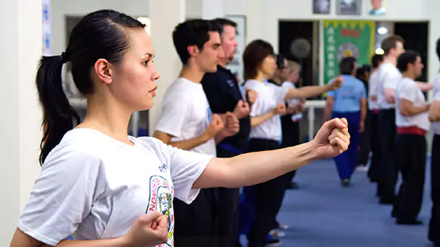 A student practises the Wing Chun punch during a warm-up at the International Wing Chun Academy.