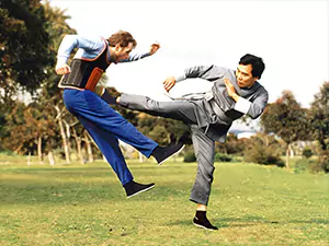 Grandmaster Jim Fung demonstrates a charging side kick.