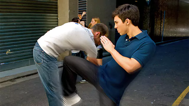 Tristan Fung demonstrates a latch and knee strike in a street self-defence scenario.